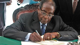 Mugabe agrees to labour law changes, appends signature