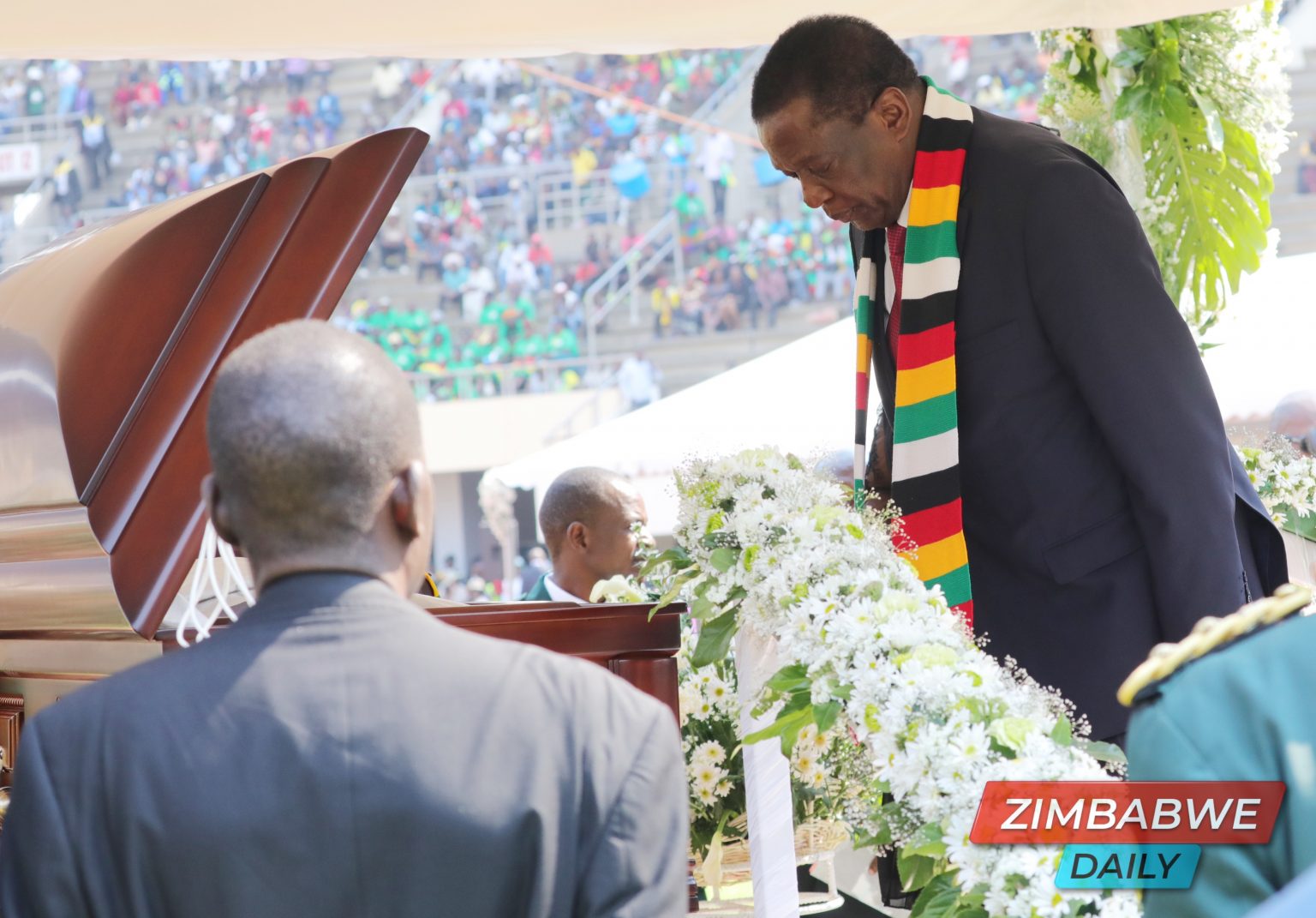 President Emmerson Mnangagwa paying his last respect to Cde Robert Gabriel during a funeral service at the National Sports Stadium in Harare